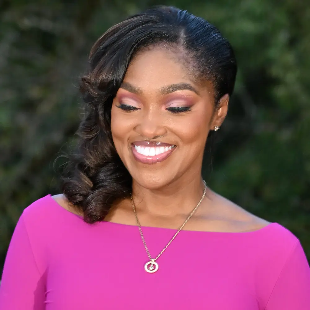 CLose-up of Dr. April Spencer smiling while gazing down
