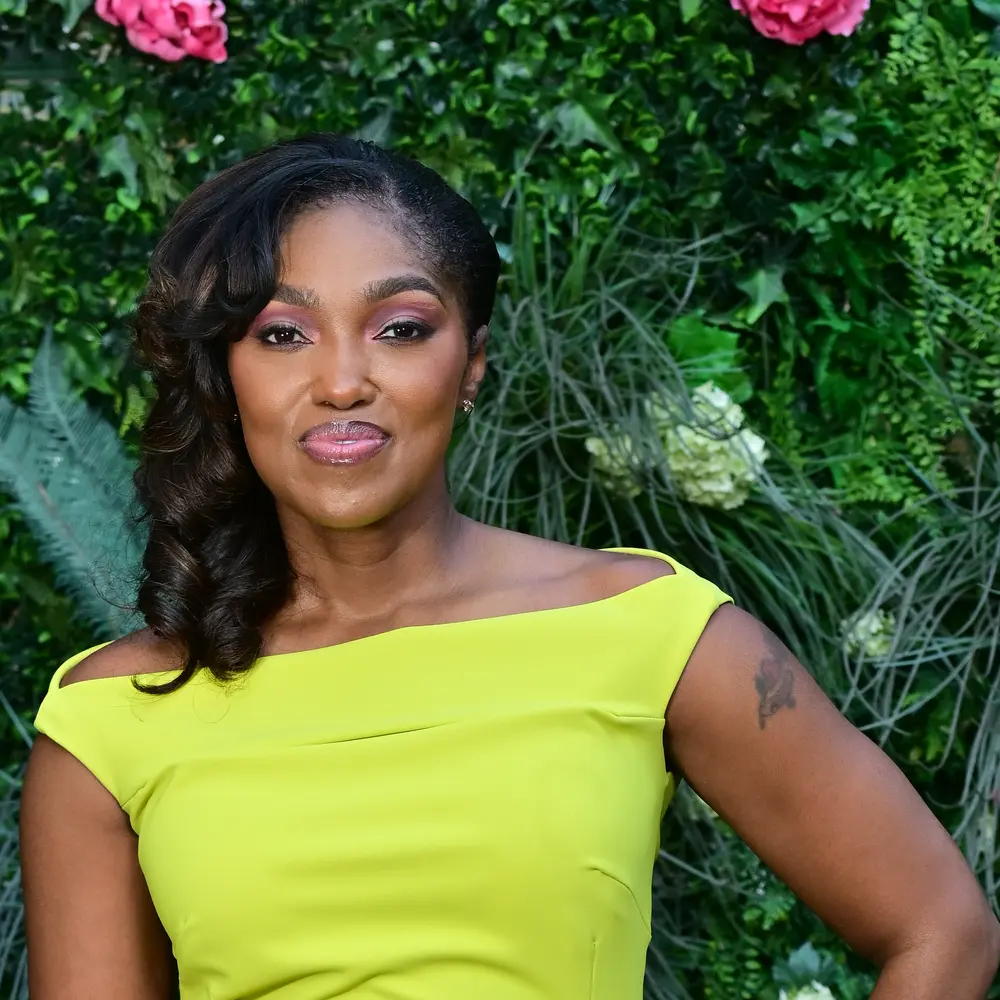 Photo of Dr. April Spencer in yellow dress